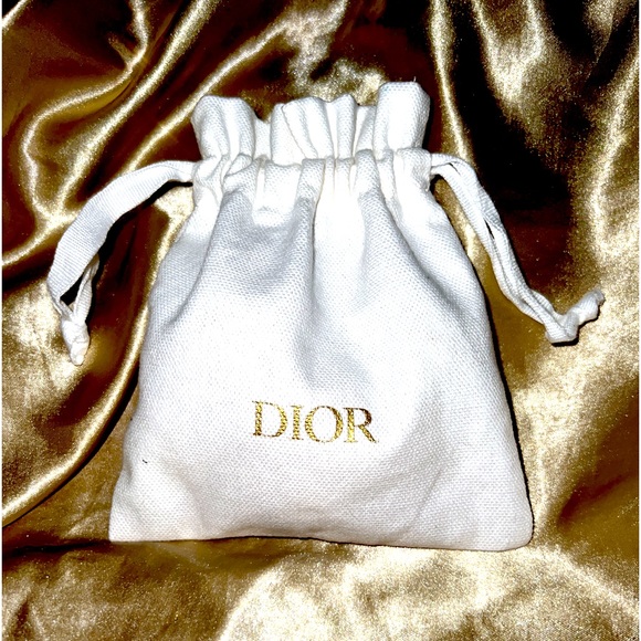 Dior Handbags - DIOR small white pouch.